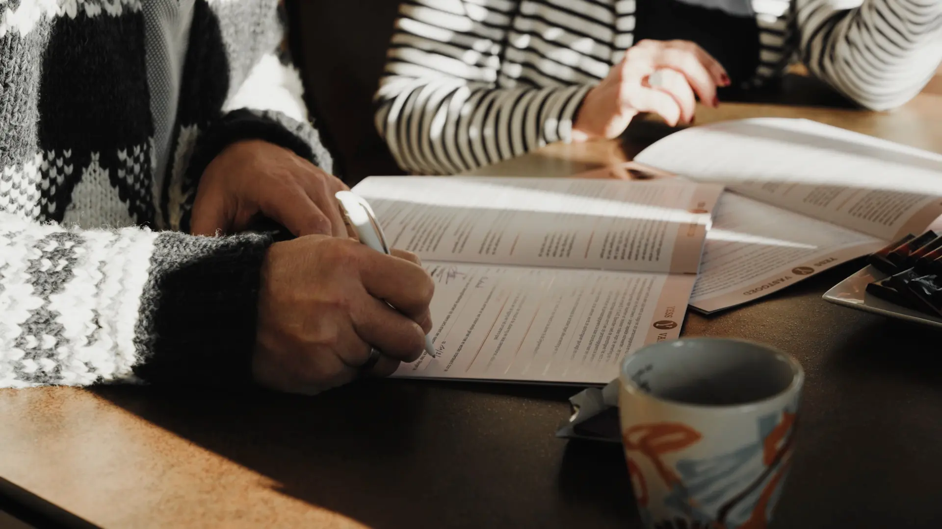 Detail van een ondertekend verkoopdossier